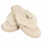 Beige flip-flop slippers with thick, fluffy wool straps and footbeds.