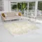 00009_Islandic White-v2 Large white Icelandic sheepskin rug with long, thick wool and natural scalloped edges.
