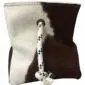 Square brown and white cowhide door stopper with a knotted rope handle.