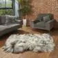 Large triple Icelandic sheepskin rug with long, thick wool in natural light grey and white tones.