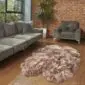 Hide Rugs_Lifestyle_0162-same-item-as-0182 Large quad sheepskin rug with thick, mottled brown and cream wool in a natural organic shape.