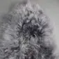 Long-haired grey Icelandic sheepskin rug with natural textured wool.