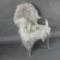 Long-haired Icelandic sheepskin rug in a linen grey colour laid flat.