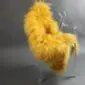 Long-haired golden yellow Icelandic sheepskin rug laid flat.