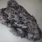 IMG_8547 Long-haired Icelandic sheepskin rug in graphite grey with a natural, irregular shape.
