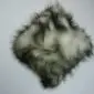 Long-haired Icelandic sheepskin cushion with cream wool and dark grey tips. detail view