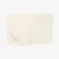 Ivory merino wool kids blanket with a folded corner and embroidered sheep detail.