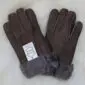 A pair of dark brown suede sheepskin gloves with grey wool-lined cuffs and visible stitching.