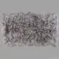 Rug-001 Large rectangular grey Icelandic sheepskin rug with long, thick wool and natural scalloped edges.
