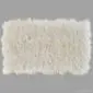 Large rectangular ivory white Icelandic sheepskin rug with a thick, long-pile wool texture and scalloped edges.