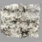 Rug-009 Large rectangular Icelandic sheepskin rug with long, textured wool in natural grey and white tones.