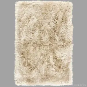 Rectangular stone-coloured sheepskin rug with a thick, textured pile.