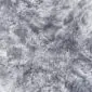 Rug-038a Close-up of a steel grey sheepskin rug with thick, textured wool pile.