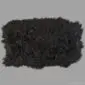 Rug-045 Rectangular black Icelandic sheepskin rug with long, thick wool and natural textured edges.
