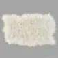 Rug-046 Large ivory Icelandic sheepskin rug with long, thick wool and natural scalloped edges.