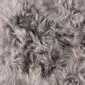 Rug-061a Close-up of a grey Icelandic sheepskin rug showing long, thick, textured wool fibres.