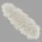 Long double ivory Icelandic sheepskin rug with thick, shaggy wool and natural organic edges.