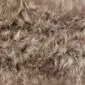Rug-078b Close-up of a taupe Icelandic sheepskin rug with long, thick, wavy wool fibres.