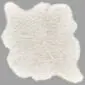 Rug-084 Ivory shorn Icelandic sheepskin rug with a natural irregular shape and short wool texture.
