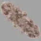 Long double sheepskin rug with thick, textured wool in a mottled taupe and grey colour.