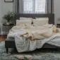Ivory double layer merino wool blanket laid flat.