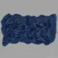 Large navy blue quad sheepskin rug with a natural wavy edge and thick wool pile.
