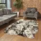 Large natural grey Icelandic sheepskin rug with long, textured wool in mixed light and dark grey tones.