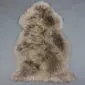 SHEEPSKIN RUG NZS-Taupe (2) Natural taupe sheepskin rug with thick, textured wool pile and an irregular organic shape.