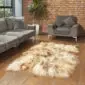 INRG4S Large rusty grey Icelandic sheepskin rug with long, thick wool and natural irregular edges on a wooden floor.
