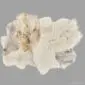 Rug-033 Irregularly shaped multi layer Icelandic sheepskin rug featuring long, textured wool in cream and light brown tones.