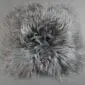 Square grey Icelandic sheepskin pad with long, shaggy wool fibres.