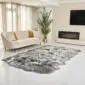 Large Icelandic sheepskin rug with long, textured grey and white wool in a natural multi-pelt shape.