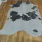 Black and White Silver Metallic Cowhide Rug CM226a Natural shaped cowhide rug with black spots on a white base and silver metallic speckles.