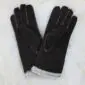 Dark brown suede sheepskin gloves with long cuffs and visible cream wool lining.