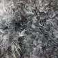 Grey Curly Gotland Sheepskin Rug GOT155 (5) Close-up of a natural grey sheepskin rug with dense, curly wool fibres. detail view detail view