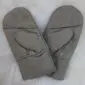 A pair of grey suede kids sheepskin mittens with visible stitching and folded cuffs.