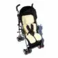 Cream sheepskin padded liner fitted inside a black stroller with a five-point harness.