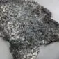 Grey Curly Gotland Sheepskin Rug GOT218 (4) Natural grey Gotland sheepskin rug with tight, curly wool texture and irregular organic shape.