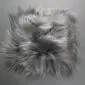 Square grey Icelandic sheepskin seat pad with long, textured wool fibres.