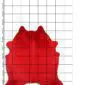 Cowhide Rug C00551 Natural shaped cowhide rug dyed in a solid vibrant red colour, displayed .