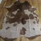 Brown and White Gold Metallic Cowhide Rug CM283 (4) Natural shaped cowhide rug with brown and white patches and rose gold metallic splatters.