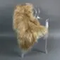 Long-haired camel coloured Icelandic sheepskin rug laid flat.