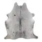Natural shaped cowhide rug with grey and white salt and pepper speckled pattern.
