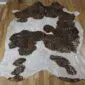 Brown and White Gold Metallic Cowhide Rug CM310 (3) Natural shaped cowhide rug with dark brown patches on a white base and metallic gold speckles.