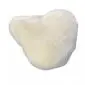 Ivory sheepskin bicycle seat cover with a thick, textured wool surface.
