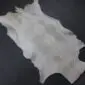 Goatskin Rug GS905c Natural goatskin rug with short grey and white mottled hair in a hide shape.