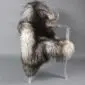 Natural grey Icelandic sheepskin rug with long, curly wool laid flat.