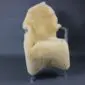 A thick, pale yellow medical Relugan sheepskin rug laid flat.