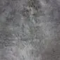 Close-up of a grey cowhide rug showing natural hair texture and tonal variations.