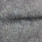 Close-up of a double Gotland sheepskin rug featuring natural grey curly wool texture.